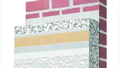 Decoratieve sierpleister wordt aangebracht op een muur